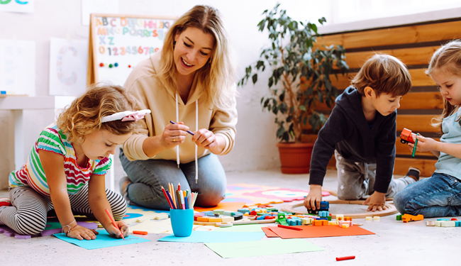 a teacher with a classroom of children